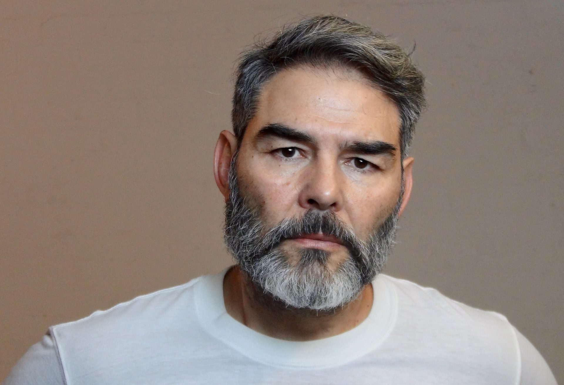 Angry bearded handsome middle aged man