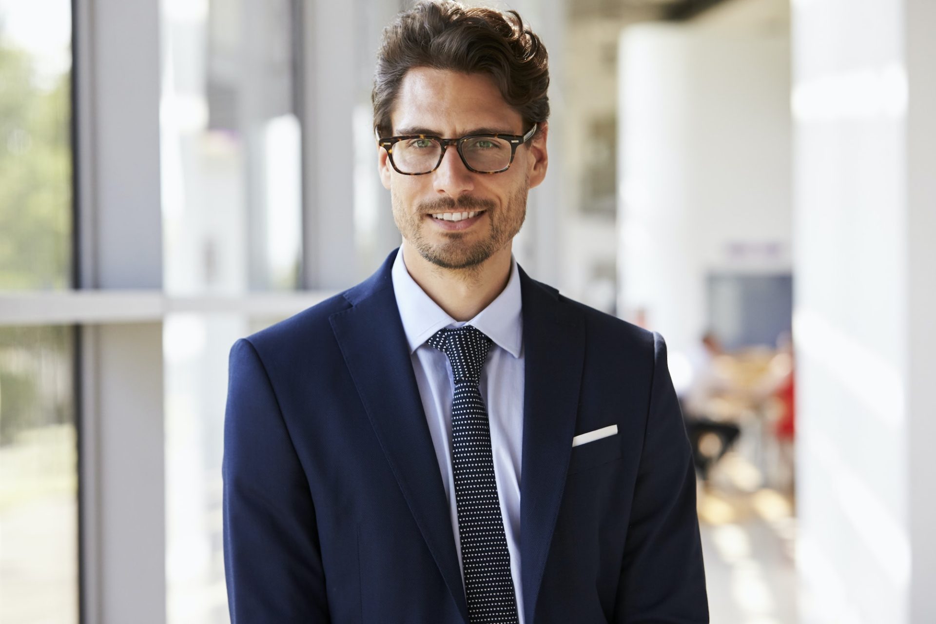 Portrait of young professional man in suit