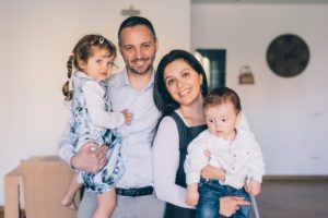 Smiling family posing together